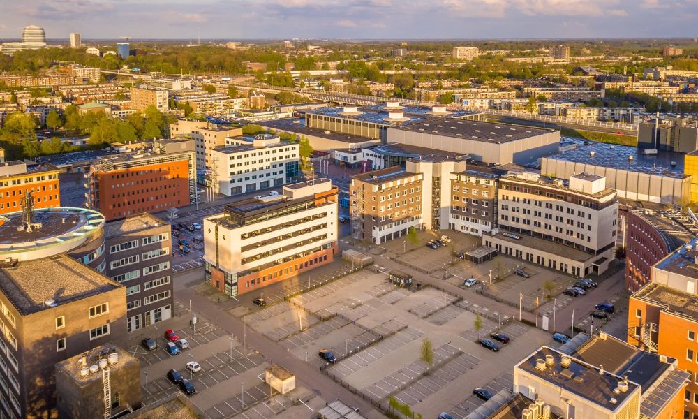 Aerial view of commercial buildings and adjoining property parcels for an ALTA title survey
