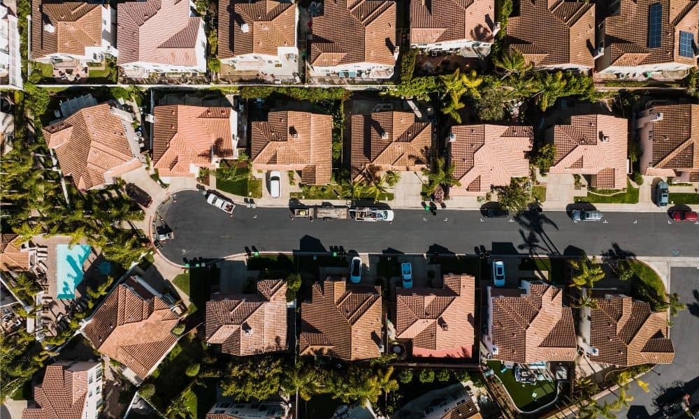 Aerial view of adjoining residential properties where a boundary survey can help support a lot-line adjustment
