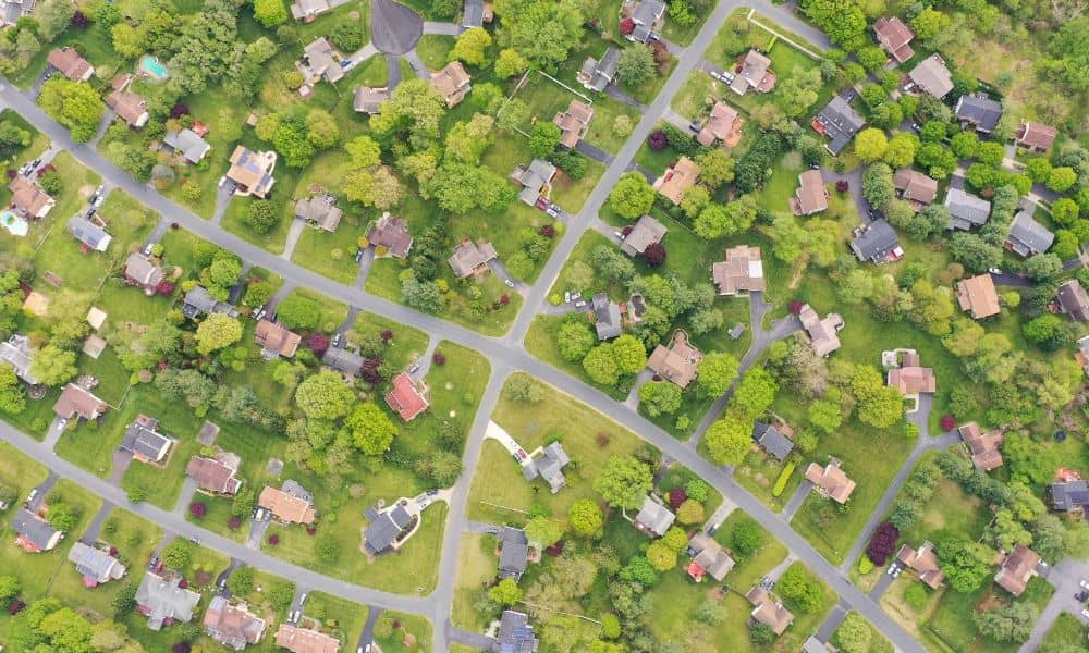 Aerial view of a residential neighborhood where a property survey documents existing lot layouts for zoning variance review