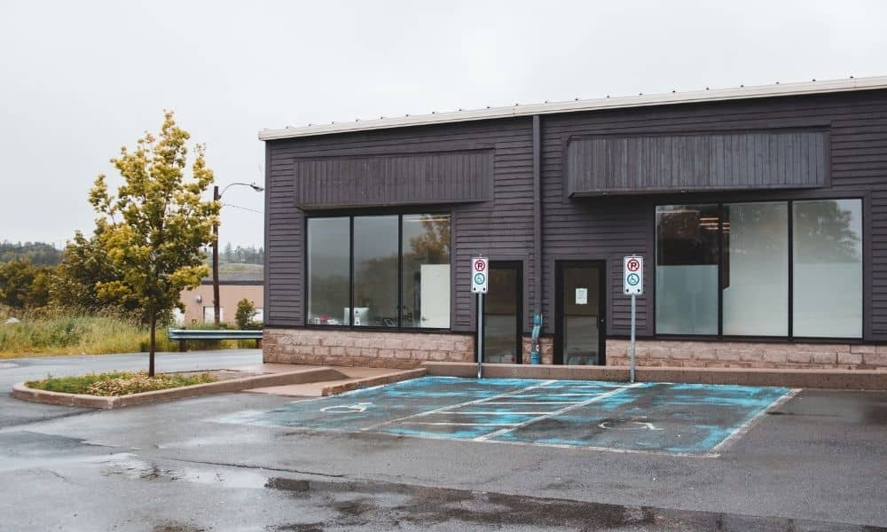 Commercial building entrance where an elevation certificate documents building and site heights for floodplain review